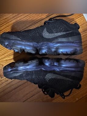 Nike Black Flyknit Sneakers with Iridescent Blue-Purple Sole